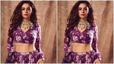 Aamna paired the midriff-baring full-sleeved blouse with a pleated silk flowy skirt of the same print. (Instagram/@aamnasharifofficial) Aamna paired the midriff-baring full-sleeved blouse with a pleated silk flowy skirt of the same print. (Instagram/@aamnasharifofficial)