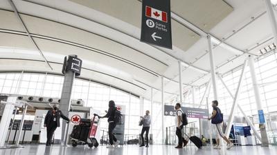 Travellers arrive at a check-in area at Toronto Pearson International Airport in Ontario. Canada is registering a record intake of students from India this year, but a leading immigration lawyer and charity groups are warning of the challenges these newcomers face on arrival. (Bloomberg) Travellers arrive at a check-in area at Toronto Pearson International Airport in Ontario. Canada is registering a record intake of students from India this year, but a leading immigration lawyer and charity groups are warning of the challenges these newcomers face on arrival. (Bloomberg)