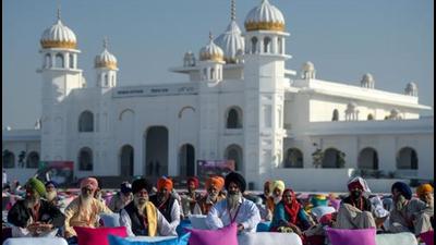The cross-border Kartarpur Corridor was opened in 2019 to allow Indian citizens visa-free access to the gurdwara at Kartarpur in Pakistan where Guru Nanak spent the last years of his life. (AFP PHOTO.)