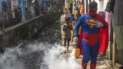 Dressed as Superman, social worker Ashok Kurmi fumigates the slums of Dharavi in Mumbai. (HT photo/ File) Dressed as Superman, social worker Ashok Kurmi fumigates the slums of Dharavi in Mumbai. (HT photo/ File)