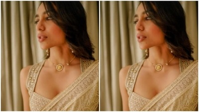 Sobhita played muse to the fashion designer Tarun Tahiliani and picked an ivory white georgette saree. (Instagram/@sobhitad)