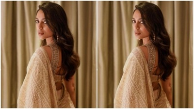 The saree is heavily embroidered in silver resham threads and zari throughout the body. (Instagram/@sobhitad)