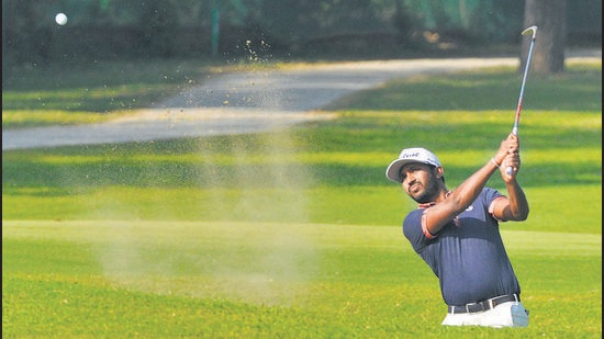 S Chikkarangappa in action during the Jeev Milkha Singh Invitational 2021 at the Chandigarh Golf Club on Thursday. Shiv Kapur and Abhijit Chadha got off to flying starts with brilliant rounds of eight-under 64 to share the first-round lead at the event. (Keshav Singh/ HT)