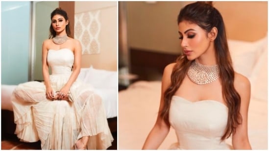 Mouni Roy ditched loud shades and opted for this off-white strapless long corset dress for her recent photoshoot for a magazine.(Instagram/@imouniroy)
