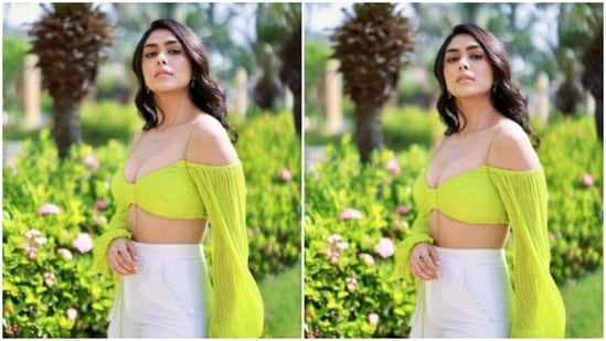 Mrunal paired her attire with contrasting white high-waisted trousers.(Instagram/@mrunalthakur)