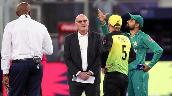 Dubai, Nov 11 (ANI): Australian skipper Aaron Finch and Pakistan Skipper Babar Azam at toss during the 2nd semi-final of ICC Men's T20 World Cup match between Australia and Pakistan, at Dubai International Cricket Stadium in Dubai on Thursday. (ANI Photo)(ANI)