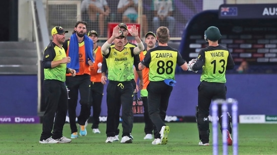 Dubai : Australia players celebrate the dismissal of Pakistan's captain Babar Azam during the Cricket Twenty20 World Cup second semi-final match between Australia and Pakistan in Dubai, UAE, Thursday, Nov. 11, 2021. AP/PTI(AP11_11_2021_000235A)(AP)