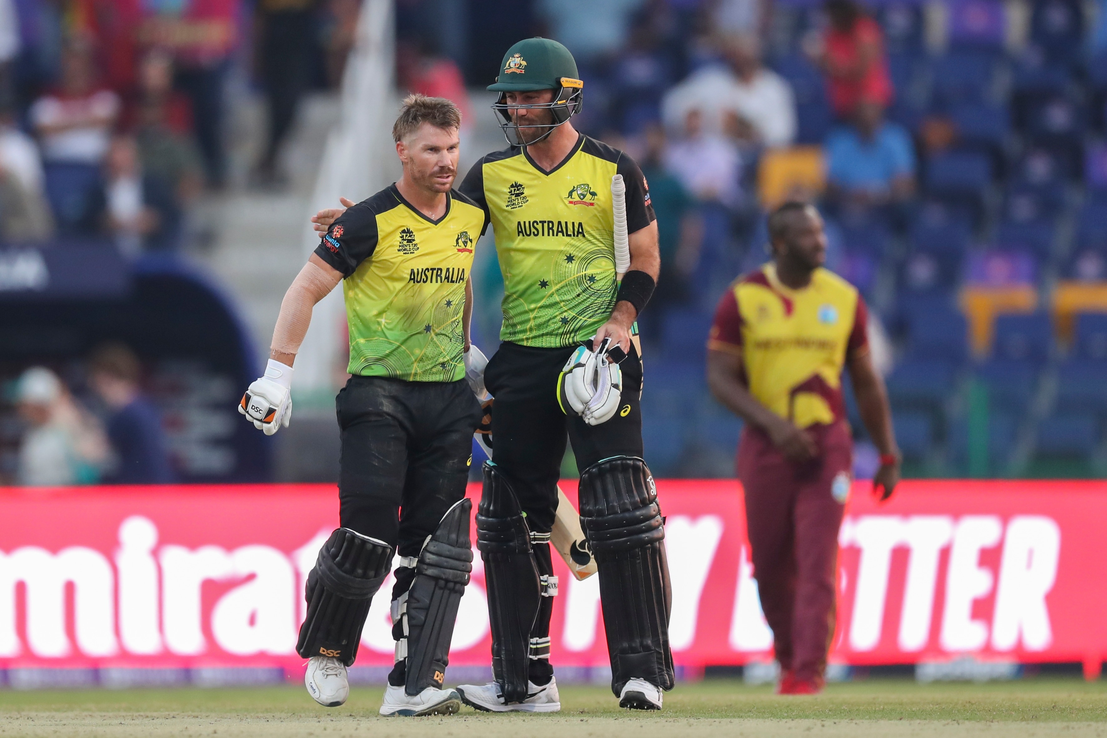 Australia's David Warner, left, and teammate Glenn Maxwell (AP) Australia's David Warner, left, and teammate Glenn Maxwell (AP)