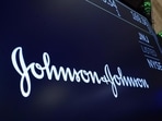 The Johnson & Johnson logo appears above a trading post on the floor of the New York Stock Exchange. The Johnson & Johnson logo appears above a trading post on the floor of the New York Stock Exchange.