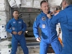 This Nasa TV frame grab image captured on November 11, 2021, shows astronaut Tom Marshburn pin the official flown Nasa astronaut insignia on ESA (European Space Agency) astronaut Matthias Maurer after the Crew-3 Crew Dragon "Endurance" successfully docked with the International Space Station. This Nasa TV frame grab image captured on November 11, 2021, shows astronaut Tom Marshburn pin the official flown Nasa astronaut insignia on ESA (European Space Agency) astronaut Matthias Maurer after the Crew-3 Crew Dragon "Endurance" successfully docked with the International Space Station. 