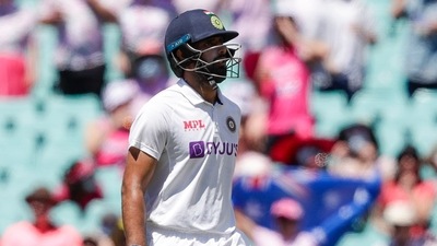 India's Hanuma Vihari walks from the field after he was run out for four runs during play on day three of the third cricket test between India and Australia at the Sydney Cricket Ground, Sydney, Australia, Saturday, Jan. 9, 2021. (AP) India's Hanuma Vihari walks from the field after he was run out for four runs during play on day three of the third cricket test between India and Australia at the Sydney Cricket Ground, Sydney, Australia, Saturday, Jan. 9, 2021. (AP)