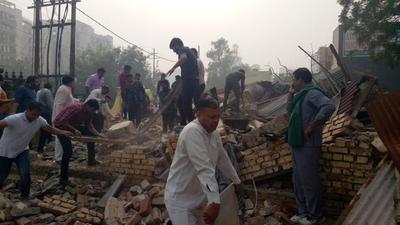 Noida officials, police halt house demolition drive midway as farmers protest Noida officials, police halt house demolition drive midway as farmers protest