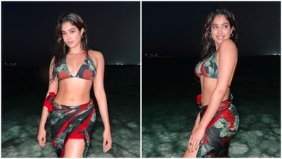Janhvi Kapoor's night photoshoot at the beach in a black and red floral bikini and sarong will surely leave you spellbound. (Instagram/@janhvikapoor) Janhvi Kapoor's night photoshoot at the beach in a black and red floral bikini and sarong will surely leave you spellbound. (Instagram/@janhvikapoor)