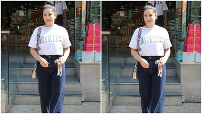 Sunny, dressed in a white tee shirt and a pair of black trousers, was spotted stepping out of a food court in Santacruz. (HT Photos/Varinder Chawla) Sunny, dressed in a white tee shirt and a pair of black trousers, was spotted stepping out of a food court in Santacruz. (HT Photos/Varinder Chawla)