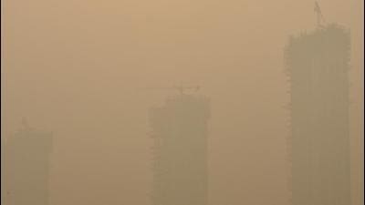 A view of a skyscraper blanketed in smog in Noida on Friday, the day the air quality index was highest in the country at 488 (Sunil Ghosh/HT photo) A view of a skyscraper blanketed in smog in Noida on Friday, the day the air quality index was highest in the country at 488 (Sunil Ghosh/HT photo)