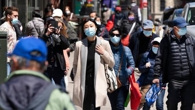 People walk the streets of New York, in the United States. (File Photo) People walk the streets of New York, in the United States. (File Photo)
