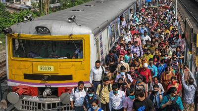 Commuters walk along a railway platform after stepping out of a train in Kolkata. Fatigue and complications are more likely in diabetics who get Covid-19, a new study has found. (AFP/File) Commuters walk along a railway platform after stepping out of a train in Kolkata. Fatigue and complications are more likely in diabetics who get Covid-19, a new study has found. (AFP/File)