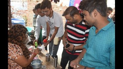 Queue of people at Sanjay Saran’s house in Chatham Lines in Prayagraj for goat milk. (HT photo) Queue of people at Sanjay Saran’s house in Chatham Lines in Prayagraj for goat milk. (HT photo)