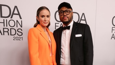 Emily Blunt and Christopher John Rogers pose on the carpet at the 2021 CFDA Awards in New York. (REUTERS)