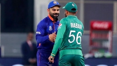India's captain Virat Kohli, left, and Pakistan's captain Babar Azam shake hands after the toss ahead of the Cricket Twenty20 World Cup match between India and Pakistan in Dubai, UAE, Sunday, Oct. 24, 2021. (AP) India's captain Virat Kohli, left, and Pakistan's captain Babar Azam shake hands after the toss ahead of the Cricket Twenty20 World Cup match between India and Pakistan in Dubai, UAE, Sunday, Oct. 24, 2021. (AP)