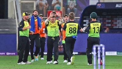 Australia players celebrate the dismissal of Pakistan's captain Babar Azam during the Cricket Twenty20 World Cup second semi-final match between Australia and Pakistan in Dubai, UAE, Thursday, Nov. 11, 2021. (AP) Australia players celebrate the dismissal of Pakistan's captain Babar Azam during the Cricket Twenty20 World Cup second semi-final match between Australia and Pakistan in Dubai, UAE, Thursday, Nov. 11, 2021. (AP)