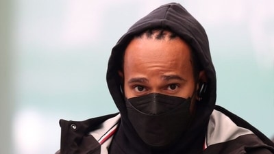 Mercedes' Lewis Hamilton arrives at the circuit ahead of practice (REUTERS)