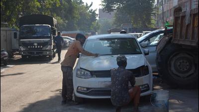 At the Motor Market, there is no space left for pedestrians as most of the times mechanics repair vehicles on the road. At the Motor Market, there is no space left for pedestrians as most of the times mechanics repair vehicles on the road.