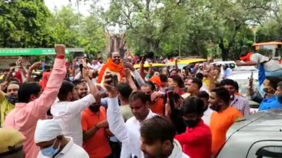 Hindu Raksha Dal chief Pinky Chaudhary, one of the accused in the Jantar Mantar case of August 8, was garlanded and carried on the shoulders of Hindu Raksha Dal supporters as he surrendered to the cops. (HT Photo/Karn Pratap Singh) Hindu Raksha Dal chief Pinky Chaudhary, one of the accused in the Jantar Mantar case of August 8, was garlanded and carried on the shoulders of Hindu Raksha Dal supporters as he surrendered to the cops. (HT Photo/Karn Pratap Singh)