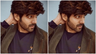 He paired it with a grey formal blazer and a dark blue pair of denims. (Instagram/@kartikaaryan) He paired it with a grey formal blazer and a dark blue pair of denims. (Instagram/@kartikaaryan)