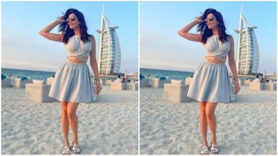 Karishma decked up in a sleeveless ivory white cropped top with a tie-back detail. (Instagram/@karishmaktanna) Karishma decked up in a sleeveless ivory white cropped top with a tie-back detail. (Instagram/@karishmaktanna)