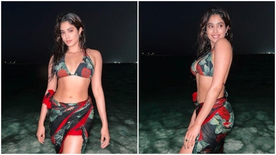 Janhvi Kapoor's night photoshoot at the beach in a black and red floral bikini and sarong will surely leave you spellbound.(Instagram/@janhvikapoor)