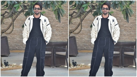 Ayushmann Khurrana looked dapper in a black tee shirt and a black pair of trousers.(HT Photos/Varinder Chawla)