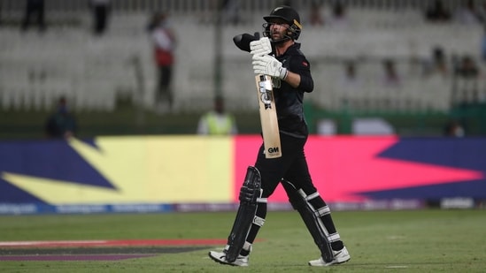 New Zealand's batter Devon Conway leaves the field after being dismissed by England's Liam Livingstone for 46 runs during the Cricket Twenty20 World Cup semi-final match between England and New Zealand in Abu Dhabi, UAE, Wednesday, Nov. 10, 2021.&nbsp;(AP)