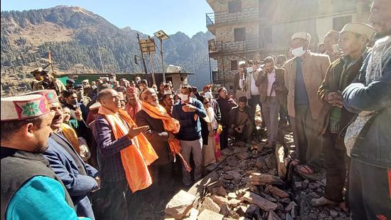Himachal CM Jai Ram Thakur interacts Malana villagers in Kullu on Friday. (ANI)