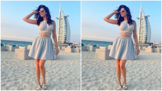 Karishma decked up in a sleeveless ivory white cropped top with a tie-back detail.(Instagram/@karishmaktanna)