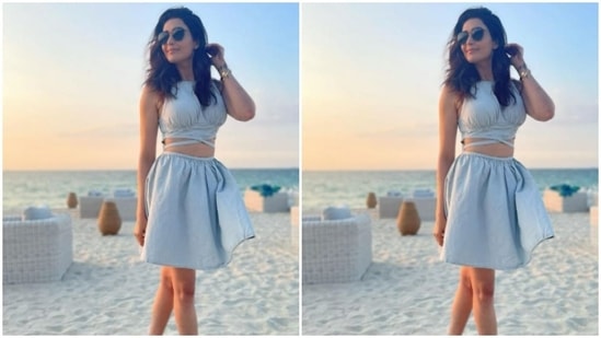Karishma paired it with a pleated short skirt of the same colour as she posed for the pictures.(Instagram/@karishmaktanna)