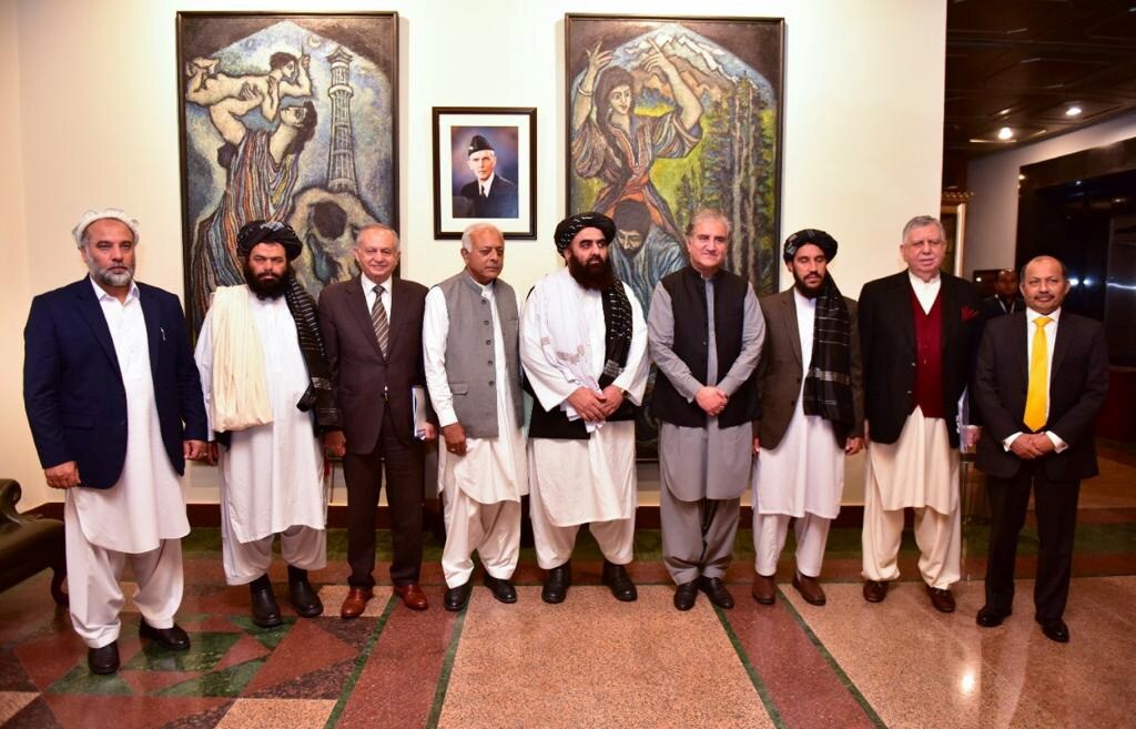 Pakistan's foreign minister Shah Mahmood Qureshi (fourth from right) with Afghan acting foreign minister Amir Khan Muttaqi (fifth from left) and the envoys from the United States, China and Russia before the "Troika plus" group conference in Islamabad, Pakistan on November 11, 2021. (Ministry of Foreign Affairs (MoFA)/Handout via REUTERS)
