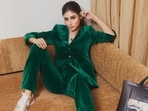 Want to serve a bombshell look as you head to work this winter or take a business trip? Let Bollywood actor Mouni Roy sort your fashion cues as she turned cover girl for a magazine and put her sartorial foot forward in a green velvet pantsuit.(Instagram/imouniroy) Want to serve a bombshell look as you head to work this winter or take a business trip? Let Bollywood actor Mouni Roy sort your fashion cues as she turned cover girl for a magazine and put her sartorial foot forward in a green velvet pantsuit.(Instagram/imouniroy)