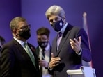 John Kerry, US special envoy for climate (right) speaks with Alok Sharma, president of the COP26 summit in Glasgow, Scotland, on Saturday. China and India, the world’s first- and third-biggest emitters, put up a tough stance to the most ambitious parts of the final agreement in Glasgow. (AP) John Kerry, US special envoy for climate (right) speaks with Alok Sharma, president of the COP26 summit in Glasgow, Scotland, on Saturday. China and India, the world’s first- and third-biggest emitters, put up a tough stance to the most ambitious parts of the final agreement in Glasgow. (AP)