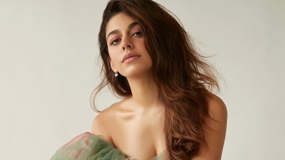 Wearing a dab of pink lipstick that matched her eyeshadow tint, Alaya amplified the glam quotient with a dewy makeup look that included mascara-laden eyelashes and filled-in eyebrows. The tulle romper gown originally costs <span class='webrupee'>₹</span>82,000 on Gauri and Nainika's designer website. (Instagram/chandiniw) Wearing a dab of pink lipstick that matched her eyeshadow tint, Alaya amplified the glam quotient with a dewy makeup look that included mascara-laden eyelashes and filled-in eyebrows. The tulle romper gown originally costs <span class='webrupee'>₹</span>82,000 on Gauri and Nainika's designer website. (Instagram/chandiniw)