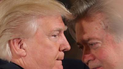 US President Donald Trump (left) talks to chief strategist Steve Bannon during a swearing in ceremony for senior staff at the White House in Washington, on January 22, 2017. (REUTERS) US President Donald Trump (left) talks to chief strategist Steve Bannon during a swearing in ceremony for senior staff at the White House in Washington, on January 22, 2017. (REUTERS)