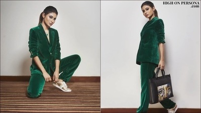 Accessorising her look with a black handbag, a green and silver neckpiece and a finger ring, Mouni pulled back her silky tresses into a high ponytail hairstyle to let her ensemble do the maximum talking. (Instagram/iambarkhaarora)