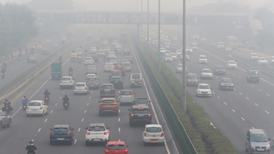 Vehicles ply amid low visibility due to a thick layer of smog at the Delhi- Gurugram Expressway on Friday.&nbsp;(Yogendra Kumar / ANI)