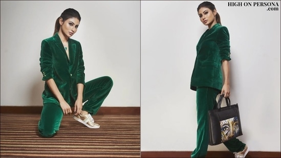 Accessorising her look with a black handbag, a green and silver neckpiece and a finger ring, Mouni pulled back her silky tresses into a high ponytail hairstyle to let her ensemble do the maximum talking.(Instagram/iambarkhaarora)