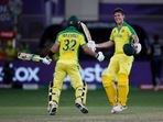 Cricket - ICC Men's T20 World Cup Final - New Zealand v Australia- Dubai International Cricket Stadium, Dubai, United Arab Emirates - November 14, 2021 Australia's Mitchell Marsh and Glenn Maxwell celebrate winning the ICC Men's T20 World Cup REUTERS/Hamad I Mohammed(REUTERS)