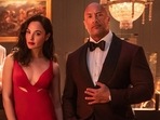 Dwayne Johnson and Gal Gadot in Red Notice. Dwayne Johnson and Gal Gadot in Red Notice.