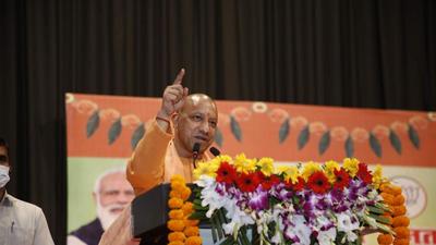Uttar Pradesh chief minister Yogi Adityanath at an event in Lucknow on Sunday. (HT Photo)