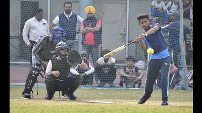 A players hits a shot during the Junior Punjab Softball Championship at Guru Nanak Stadium in Ludhiana on Sunday, (Harsimar Pal Singh/HT)