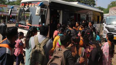 Commuters rush for seat in a private bus following strike by MSRTC staff, in Pune on November 11. (HT PHOTO) Commuters rush for seat in a private bus following strike by MSRTC staff, in Pune on November 11. (HT PHOTO)