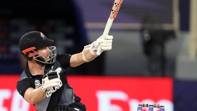 New Zealand's captain Kane Williamson plays a shot during the ICC Men's T20 World Cup final match between New Zealand and Australia, at Dubai International Stadium in Dubai on Sunday. (ANI)